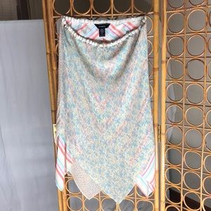 This is a great skirt The 3 patterns work together size L but is very forgiving